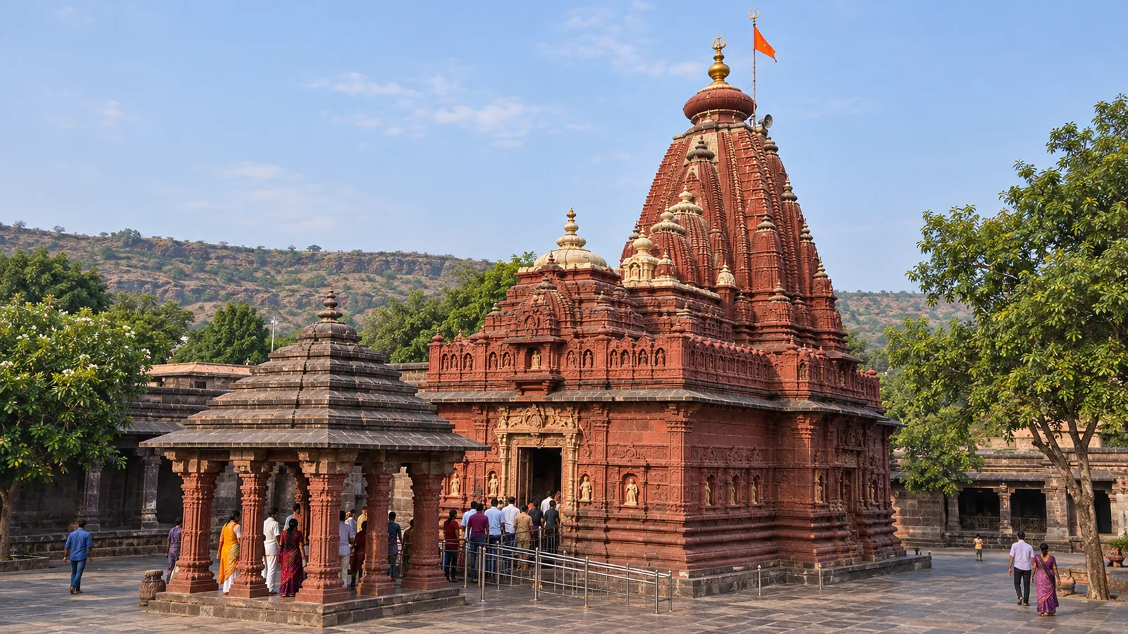 AI-generated illustration of present-day Grishneshwar Jyotirlinga Temple in Verul, showing its red-stone shrine, carved shikhara and stone courtyard. An illustration, not a photograph.